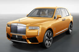Rolls Royce Cullinan exterior front right in Arizona Sun colour